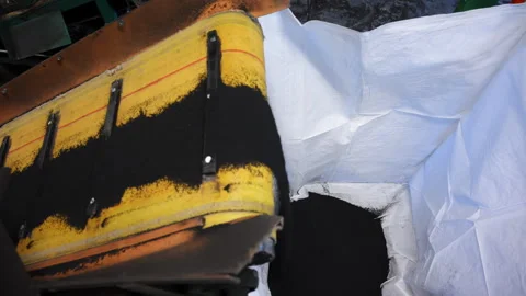 A powerful shredder breaks down old tires for future manufacturing use. Видео 304327577