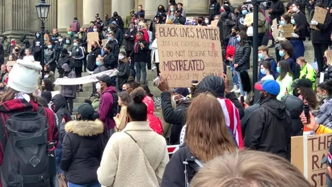 Powerful sign being held at a Black Lives Matter protest in Leeds, UK. Stock Footage 132069736