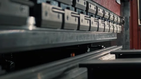 Powerful steel teeth of the heavy machine tool of the hydraulic press Stock Footage 265508654