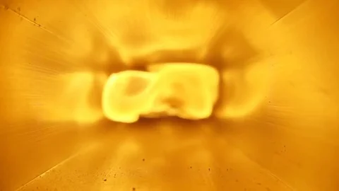 A powerful stream of bright fire flies through the tunnel directly to the camera Stock-Footage 82714697