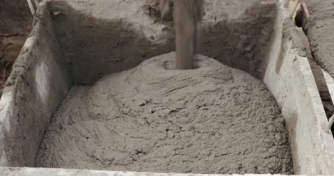 Powerful stream of fresh mortar, materials for construction were brought to site Stock Footage 130367642