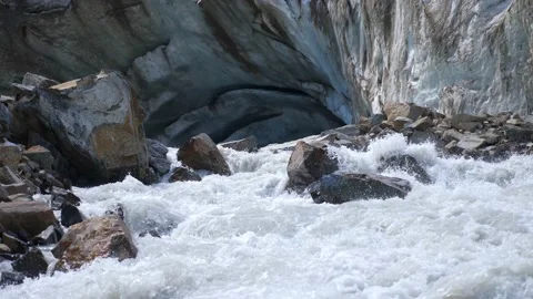Powerful stream goes from a glacier in the mountains. Stock Footage 159337940