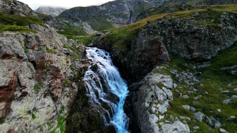 Powerful stream of a mountain river with clear water Stock Footage 138430566