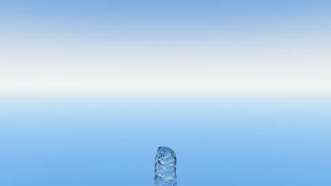 A powerful stream of water escapes from the bottom of the screen against a blue 스톡 동영상 123022918