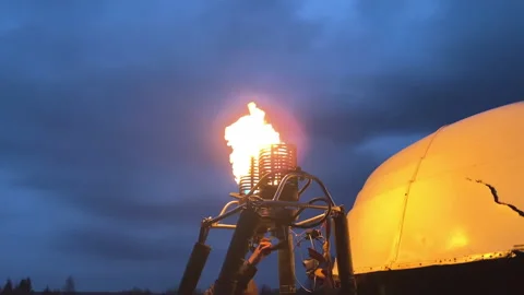 Powerful streams of fire erupt from the balloon burner Stock Footage 155482098