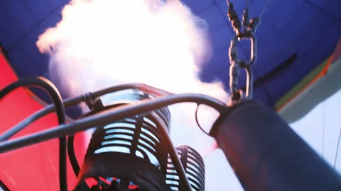 Powerful streams of fire erupt from the burner of the balloon Video stock 155614398