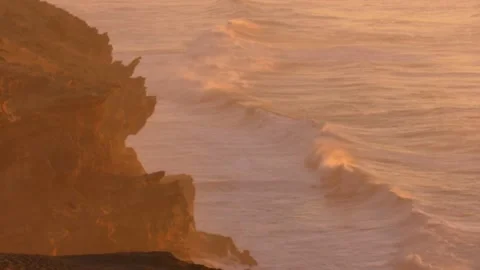 Powerful Surfing Waves at Sunset Light on Atlantic Ocean Coast in Morocco Stock Footage 227347512
