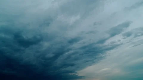 A powerful thunderstorm front. Dark storm clouds are gathering in the sky. Stock Footage 315737087