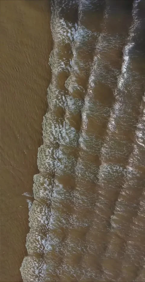Powerful Tidal Bore Waves Creating Foamy Patterns in Qiantang River China Stock Footage 339594274