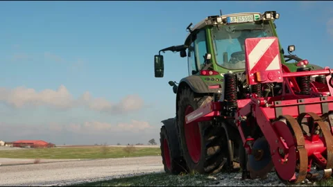 Powerful Tractor Plowing Field in 4K – Agricultural Machinery in Action Stock Footage 305187339