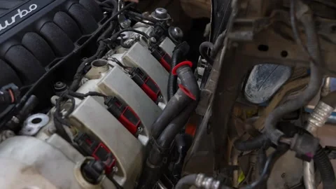 Powerful turbo v8 car engine repairing in garage Stock Footage 325494383