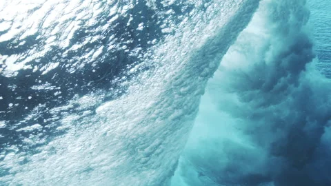 Powerful Turquoise Underwater Wave Face Curling Stock Footage 329090918