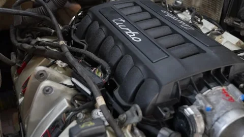 Powerful v8 turbo car engine under the hood Stock Footage 325494414