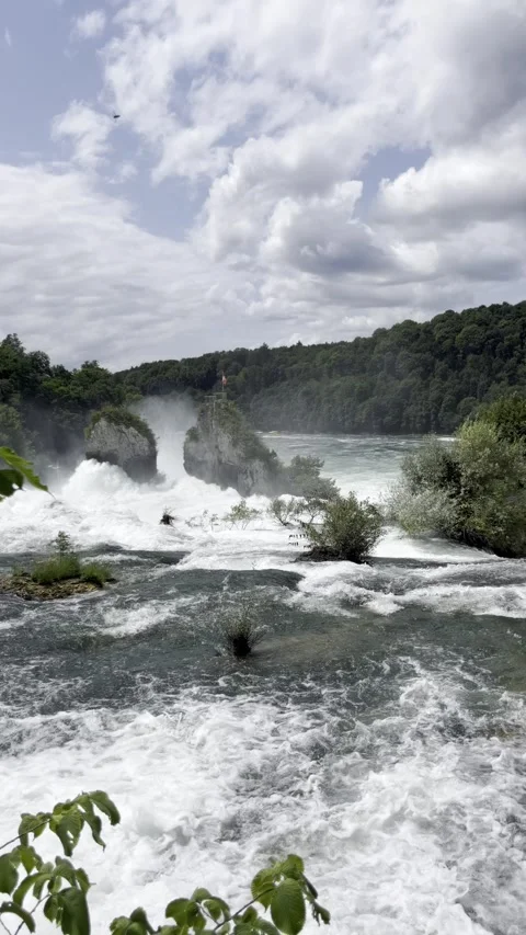 Powerful water flow at Rhine Falls in Switzerland Stock Footage 306068270