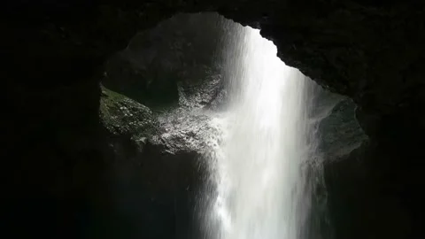 Powerful Water Flow Through Hole In Wall Cascada Del Amor En Jardín Stock Footage
