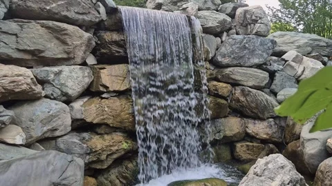 Powerful water flowing over mossy rocks at waterfall Stock Footage 341755058
