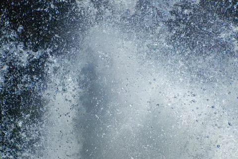 Powerful water splash creating dynamic abstract pattern Stock Photos