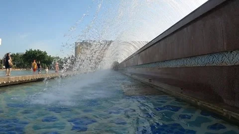 Powerful water streams from a public cascade fountain in Tashkent Stock Footage 335351877