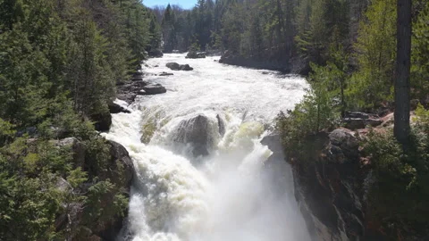 Powerful Waterfall Aerial View Surrounded by Forest – 4K Drone Footage Stock Footage 307463560