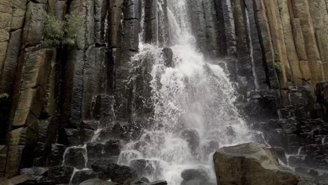 Powerful Waterfall Cascading Down Basalt Rock Columns in Mexico Nature Close Up Stock Footage 336369126