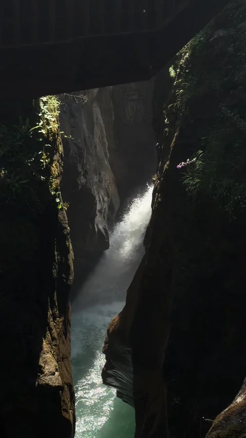 Powerful Waterfall in Deep Rocky Gorge Under Sunlight Stock-Footage 346589368