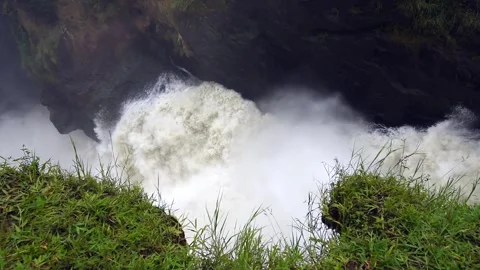 Powerful Waterfall Flowing in Ugandan Wilderness 4k Video Stock Footage 338263896