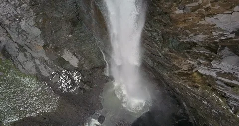 Powerful waterfall splashing down into canyon pool. Stock Footage 111307074