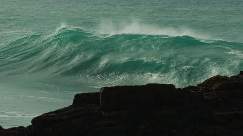 Powerful Wave Breaking on dry reef Stock Footage 136039141