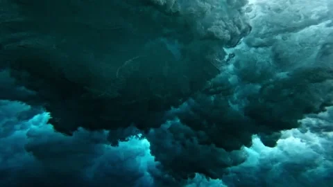 Powerful wave breaks underwater turbulence, strong wave crashing, clouds. Видео 284897046