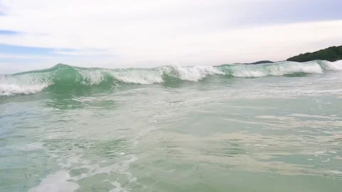 Powerful wave rolling made water splash and foaming on the seashore Stock Footage 198819245