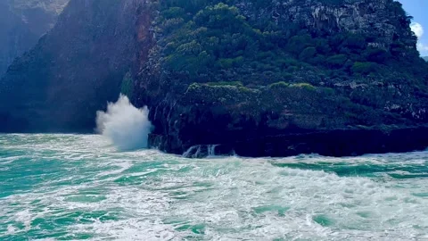 Powerful waves crashing against steep cliffs. Portugal. Stock Footage 304584352