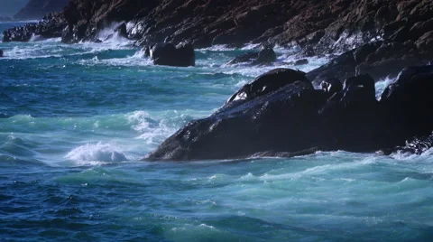 Powerful waves crashing on the beach Stock Footage 67376049