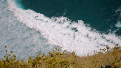 Powerful waves crashing slow-motion top view Stock Footage 303395786