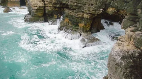 Powerful waves pound cliff in the Atlantic Video stock 69822474