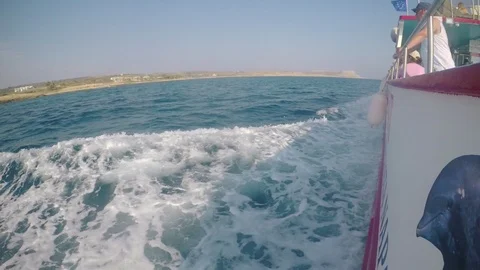 Powerful waves pulled out from fast moving ship, a huge stream of deep blue Stock Footage 95247834