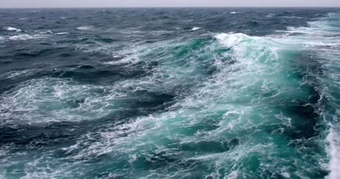 Powerful waves pulled out from fast moving cruise ship Stockbeeldmateriaal 142705095