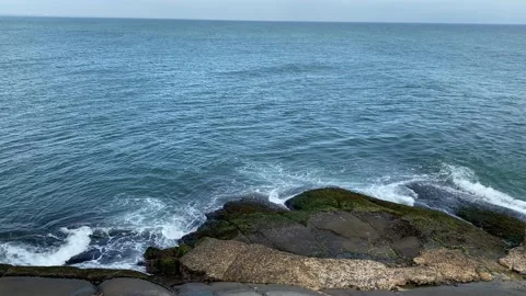 Powerful Waves on a rocky beach Video stock 164869911