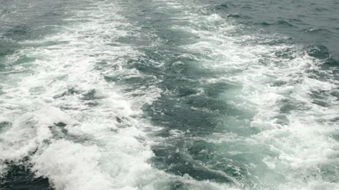 Powerful White Foam Wake Trail Behind a Speeding Ship Stock Footage 330859331