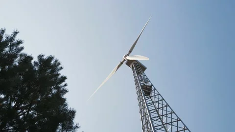 A powerful wind generator changes the position of the installation depending on Stock Footage 106821081