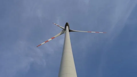 Powerful wind turbine generator generating clean renewable energy electricity Stock Footage 290319115