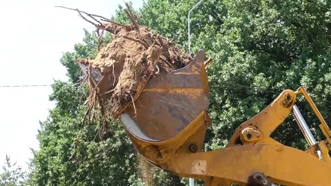 Powerful yellow bulldozer digs the ground Video stock 222585545
