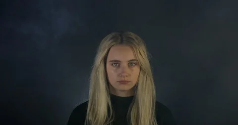 Powerful Young Blonde Model Staring at the Camera With Beautiful Blue Eyes Stock Footage 109202545