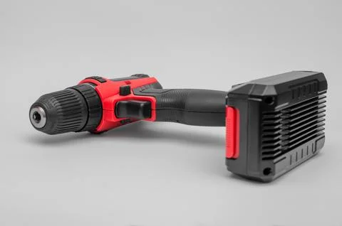 A powerless screwdriver with a screw bit on a white background. isolated. Stock Photos