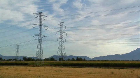 Powerlines and mountains with cornfield timelapse Stock Footage 74093881