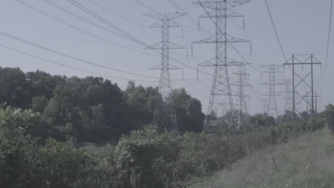 Powerlines in a field in the Midwest Video stock 274224719