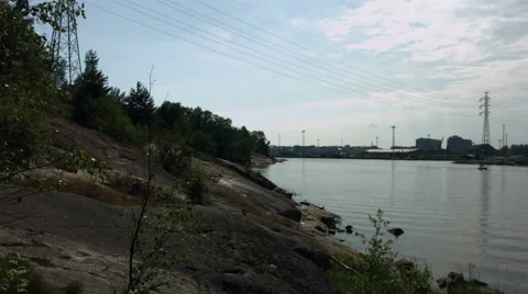Powerlines over a river Stock Footage 49684932