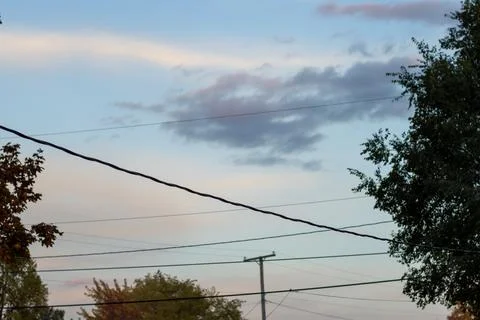 Powerlines at sunset Foto stock