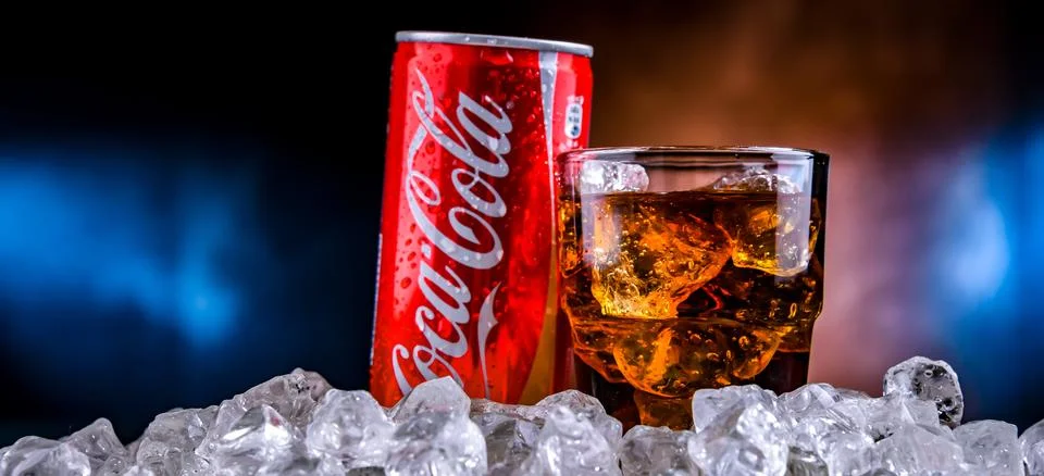 POZNAN, POL - NOV 24, 2022: Can of Coca-Cola, a carbonated soft drink manufac Stock Photos