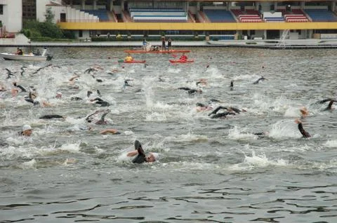 POZNAN, POLAND - AUGUST 04: Unidentified swimers during triathlon on Malta in Stock Photos