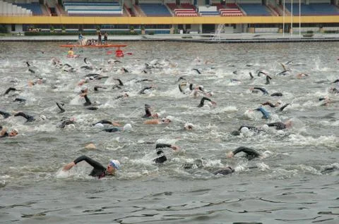 POZNAN, POLAND - AUGUST 04: Unidentified swimers during triathlon on Malta in Stock Photos